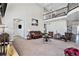 Two-story living room with a loft and high ceilings at 11898 Discovery Cir, Parker, CO 80138