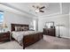 Spacious main bedroom with ceiling fan and ensuite bathroom at 11898 Discovery Cir, Parker, CO 80138