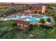 Community pool with a unique design at dusk at 11898 Discovery Cir, Parker, CO 80138