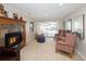 Cozy basement Gathering room with fireplace and comfortable seating at 7107 E Costilla Dr, Centennial, CO 80112