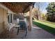 Covered patio with seating area, ideal for relaxing outdoors at 7107 E Costilla Dr, Centennial, CO 80112