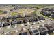 An aerial shot of a residential area with modern homes, solar panels, and a well-planned street layout at 13221 E 110Th Pl, Commerce City, CO 80022