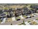 Attractive residential street with modern homes, solar panels, landscaped front yards, and convenient parking at 13221 E 110Th Pl, Commerce City, CO 80022