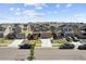 Charming street view of suburban homes featuring manicured lawns, mature trees, and a friendly neighborhood atmosphere at 13221 E 110Th Pl, Commerce City, CO 80022