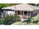 Cute gray house with updated landscaping, viewed from above at 3061 S Grant St, Englewood, CO 80113