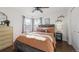 Bright bedroom with a comfortable bed, dresser, and plenty of natural light at 3061 S Grant St, Englewood, CO 80113