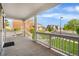 View from porch of the community's street with sidewalks, lawns and neighboring homes at 9515 E 109Th Cir, Commerce City, CO 80640