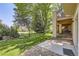 Manicured backyard lawn and patio space at 7452 S Utica St, Littleton, CO 80128