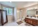 Bathroom featuring tile flooring, modern fixtures, and a walk-in shower at 7452 S Utica St, Littleton, CO 80128