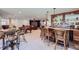 Spacious game room featuring a pool table, bar, and multiple seating areas at 7452 S Utica St, Littleton, CO 80128
