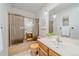 A full bathroom featuring a shower and tub combination, and modern vanity and lighting fixtures at 31 Irene Ct, Broomfield, CO 80020