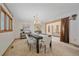 Elegant dining room showcasing a modern chandelier, stylish decor, and an inviting space for entertaining guests at 31 Irene Ct, Broomfield, CO 80020