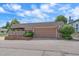 Attached two-car garage showcasing the home's exterior with a well-maintained front yard at 31 Irene Ct, Broomfield, CO 80020