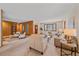 Spacious living area featuring wood accents, an open floor plan, and inviting seating arrangements for relaxation at 31 Irene Ct, Broomfield, CO 80020