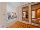 Bright living room features hardwood floors, an inviting fireplace, and seamless transition to a cozy sitting room at 31 Irene Ct, Broomfield, CO 80020