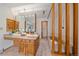 Spacious main bathroom featuring a double sink vanity, ample counter space, bathtub, and updated decor at 31 Irene Ct, Broomfield, CO 80020