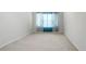 Light-filled bedroom with neutral carpet at 12502 E Harvard Cir, Aurora, CO 80014