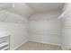 Spacious walk-in closet with shelving at 12502 E Harvard Cir, Aurora, CO 80014
