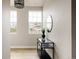 Inviting entryway boasting wood floors and contemporary decor at 6303 Elmira St, Denver, CO 80238