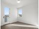 Bedroom with a large sliding glass door and neighborhood views at 5584 Moosehead Cir, Longmont, CO 80504