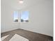 Bedroom with large windows overlooking the surrounding neighborhood at 5584 Moosehead Cir, Longmont, CO 80504