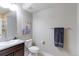 Bathroom with a modern vanity, a sink, and a shower with glass door, along with contemporary decor at 16021 Williams Pl, Broomfield, CO 80023