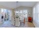 Bright dining room featuring a stylish table, chairs, and elegant decor at 16021 Williams Pl, Broomfield, CO 80023