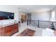 Open loft space featuring wood accents, comfortable furnishings, and decorative details at 16021 Williams Pl, Broomfield, CO 80023