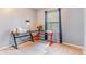 Bedroom space features a large window for natural light, perfect for a home office at 5320 E 100Th Dr, Thornton, CO 80229