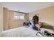 Finished basement with storage rack, neutral walls, carpet floors, and a window view at 29 Woodland Cir, Highlands Ranch, CO 80126