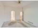 Spacious bedroom showing doorway access to the bathroom and hallway at 29 Woodland Cir, Highlands Ranch, CO 80126