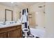 Bathroom with coordinated shower curtain and updated fixtures at 1240 S Idalia St, Aurora, CO 80017