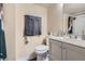 Cozy bathroom with a modern vanity, neutral finishes, and decorative touches at 1240 S Idalia St, Aurora, CO 80017