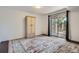 Bedroom with wardrobe and sliding glass door to outdoor space at 1240 S Idalia St, Aurora, CO 80017
