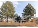 Street view of charming home with wood fence at 1360 Wolff St, Denver, CO 80204