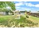 A spacious backyard with a well-maintained lawn and a storage shed at 6500 W 32Nd Ave, Wheat Ridge, CO 80033