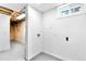 Utility area with hookups, small window and white walls at 6500 W 32Nd Ave, Wheat Ridge, CO 80033