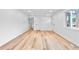 Bright living room featuring hardwood floors, fresh paint and a cozy atmosphere at 6500 W 32Nd Ave, Wheat Ridge, CO 80033