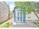 Charming storage shed with double doors, perfect for outdoor equipment at 6500 W 32Nd Ave, Wheat Ridge, CO 80033