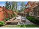 Beautiful backyard with a modern fire pit, comfortable seating, and well-maintained landscaping at 2891 E Alameda Ave, Denver, CO 80209