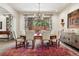 Elegant dining room with a chandelier, large window and stylish decor at 2891 E Alameda Ave, Denver, CO 80209