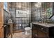 Chic powder room with metallic wallpaper, granite counter, and tiled floor at 2891 E Alameda Ave, Denver, CO 80209