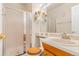 Well-maintained bathroom with a glass-enclosed shower, stylish fixtures, and a clean, bright design at 42 S Moline St, Aurora, CO 80012