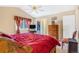 Bedroom featuring a closet, dresser, natural light, and comfortable furniture at 42 S Moline St, Aurora, CO 80012