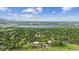 Stunning aerial view of the neighborhood and lake near the home at 2605 Cactus Cir, Golden, CO 80401