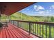 Inviting back porch with beautiful mountain views and stylish seating area at 2605 Cactus Cir, Golden, CO 80401