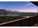 Balcony view featuring a mountain range and city lights at 2605 Cactus Cir, Golden, CO 80401