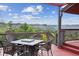 Outdoor deck features cozy seating and fire pit, ideal for entertaining and enjoying scenic mountain vistas at 2605 Cactus Cir, Golden, CO 80401