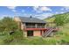 Charming home features an outdoor deck and scenic views, blending comfort and natural beauty at 2605 Cactus Cir, Golden, CO 80401