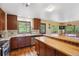 Spacious kitchen features stainless appliances, wood cabinets and breakfast bar at 2605 Cactus Cir, Golden, CO 80401